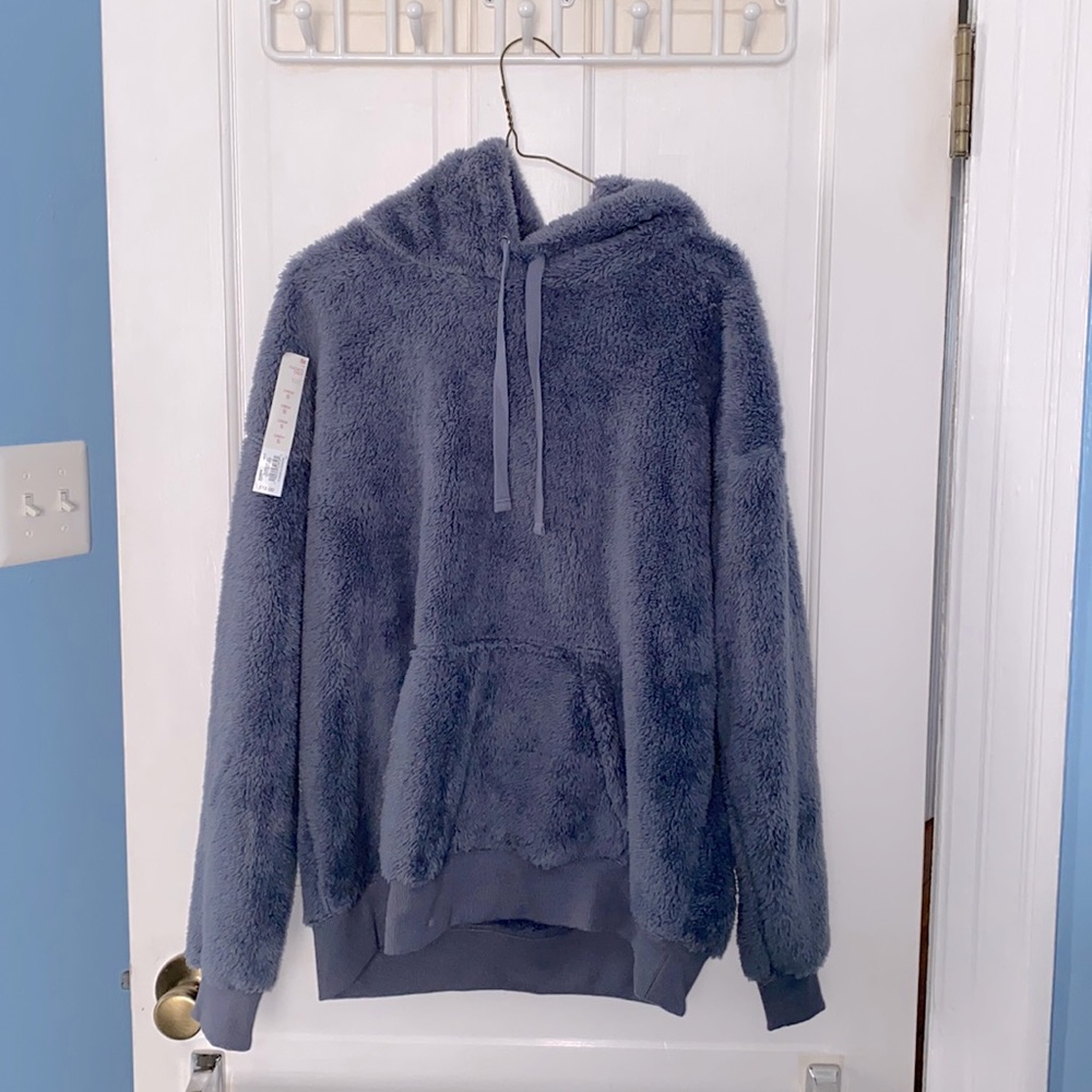 blue fuzzy hooded sweatshirt